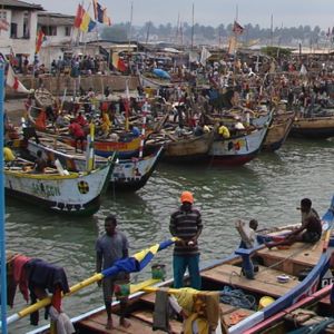Boats and people on a Ghanian river