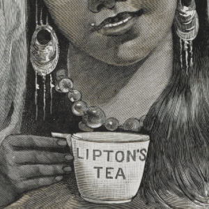 Close up image of an Indian girl in traditional northern Indian hill attire holding a cup of tea that says Lipton's tea