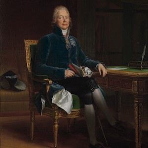 Portrait of a man sitting at a table