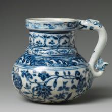 Porcelain tankard with blue ornate decorations 